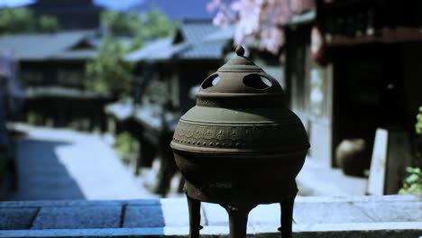 close-up of a traditional incense burner in a chinese village