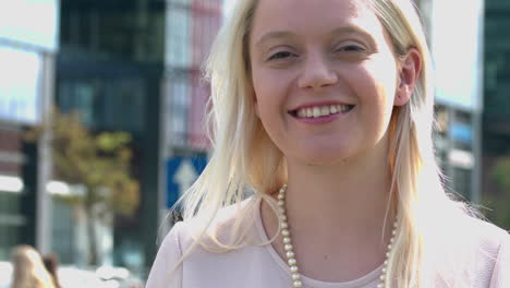 The-woman-is-smiling-at-the-camera