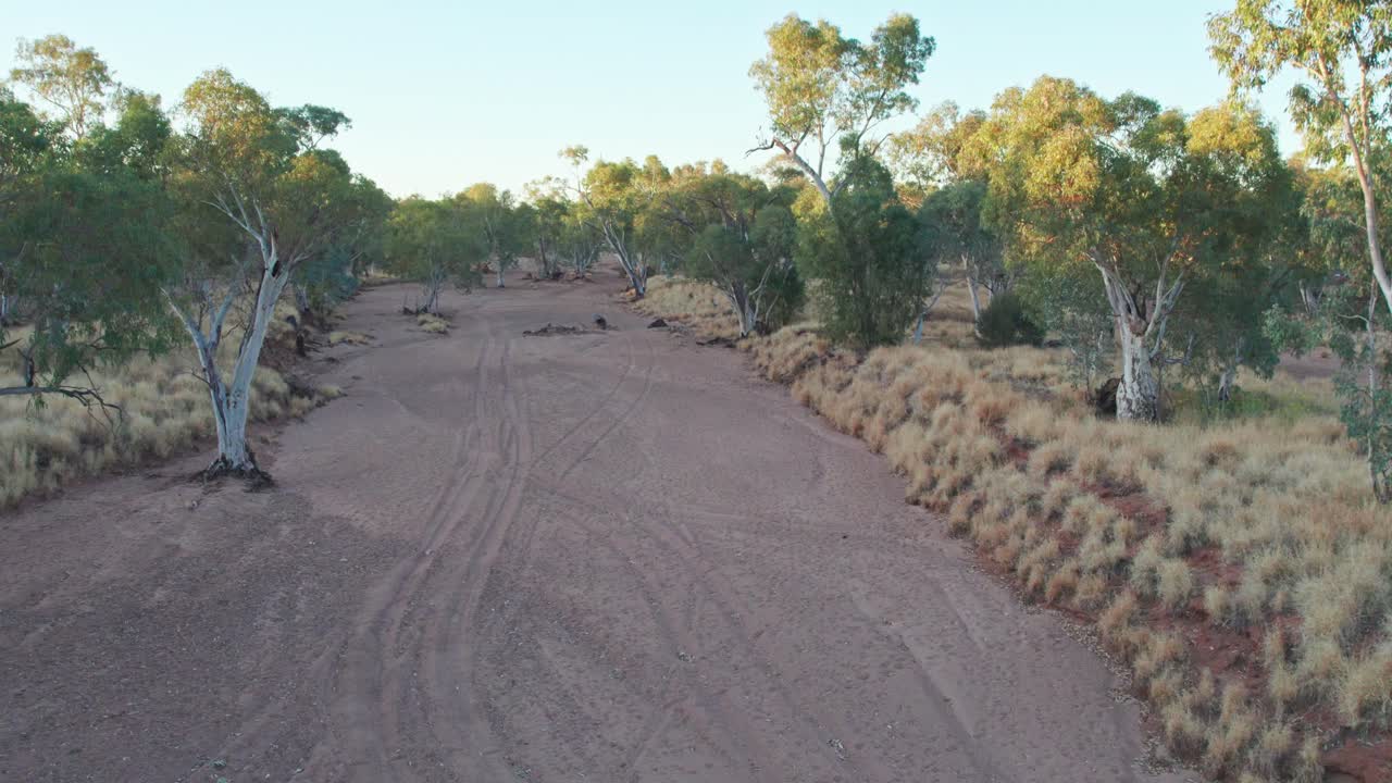 Sideways footage across the dry dry Todd River. Alice Springs, Mparntwe, Northern Territory, Australia. August 2022.