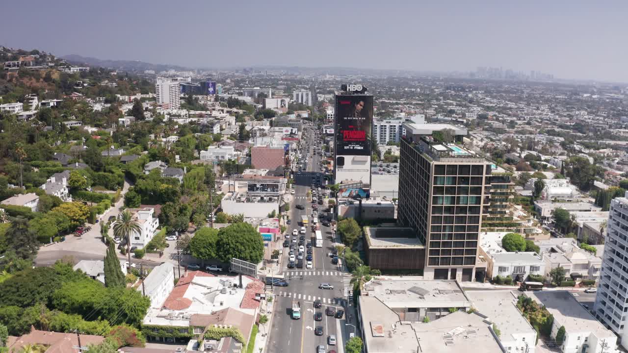 Aerial wide shot flying over the Sunset Strip in West Hollywood, California. 4K