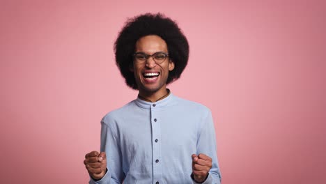 Video-of-young-African-man-very-surprised-in-studio-shot