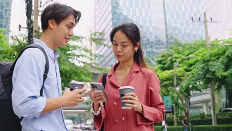 People in the city with coffee and a phone