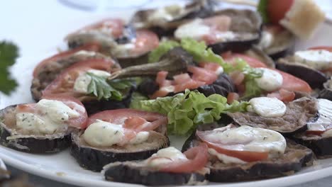 sandwiches with salmon laid on a plate