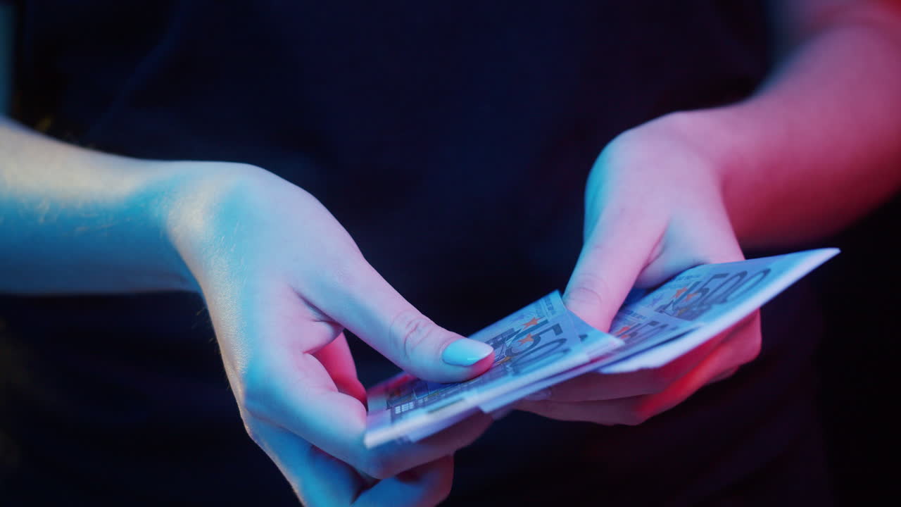 Euro banknotes in hand