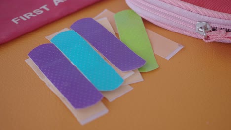 assorted band-aids in a first aid kit