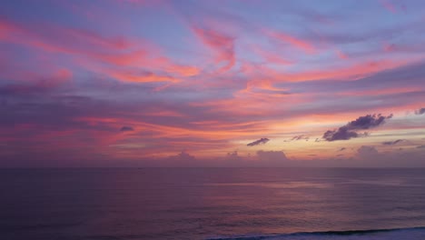 aerial view reflection of sweet cloud in sunset on the beach.