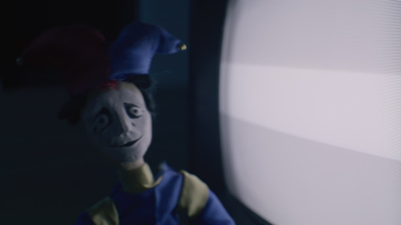 Creepy Jester Puppet and Old TV