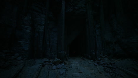Mysterious dark entrance in a distant cave during nighttime exploration