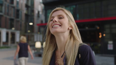 portrait of young beautiful blonde woman smiling happy enjoying urban lifestyle