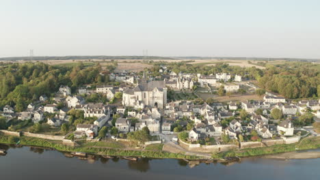 aerial drone point of view of the village of candes saint martin on the confluence of the loire and vienne rivers in central france