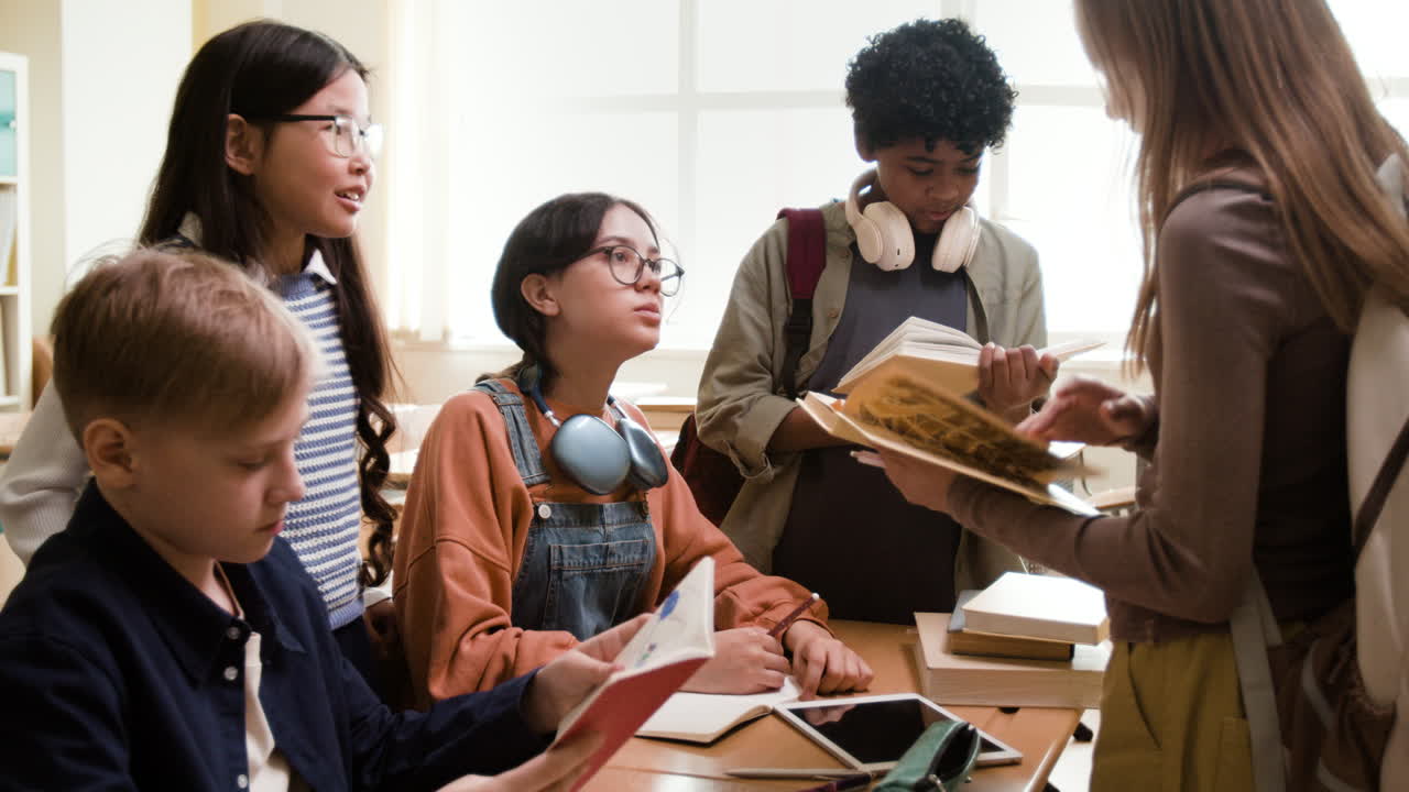 Diverse Group of Students Collaborating and Studying Together in a Classroom