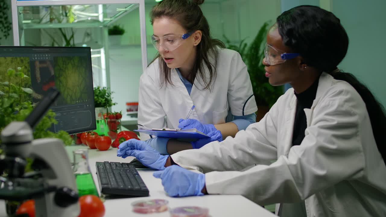 Medical team researchers analyzing botany expertise on computer