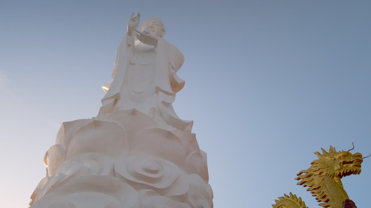 White Statue and Dragon Detail at a Temple