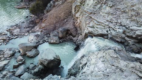 ngakoro waterfall and lake in wai-o-tapu thermal wonderland reserve new zealand