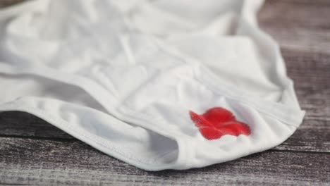 white underwear with a blood stain