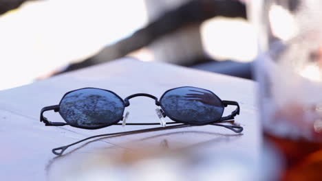 sunglasses on table