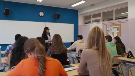 classroom with teacher and students