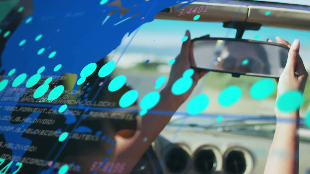 Adjusting rearview mirror, hands with digital animation of data and blue dots