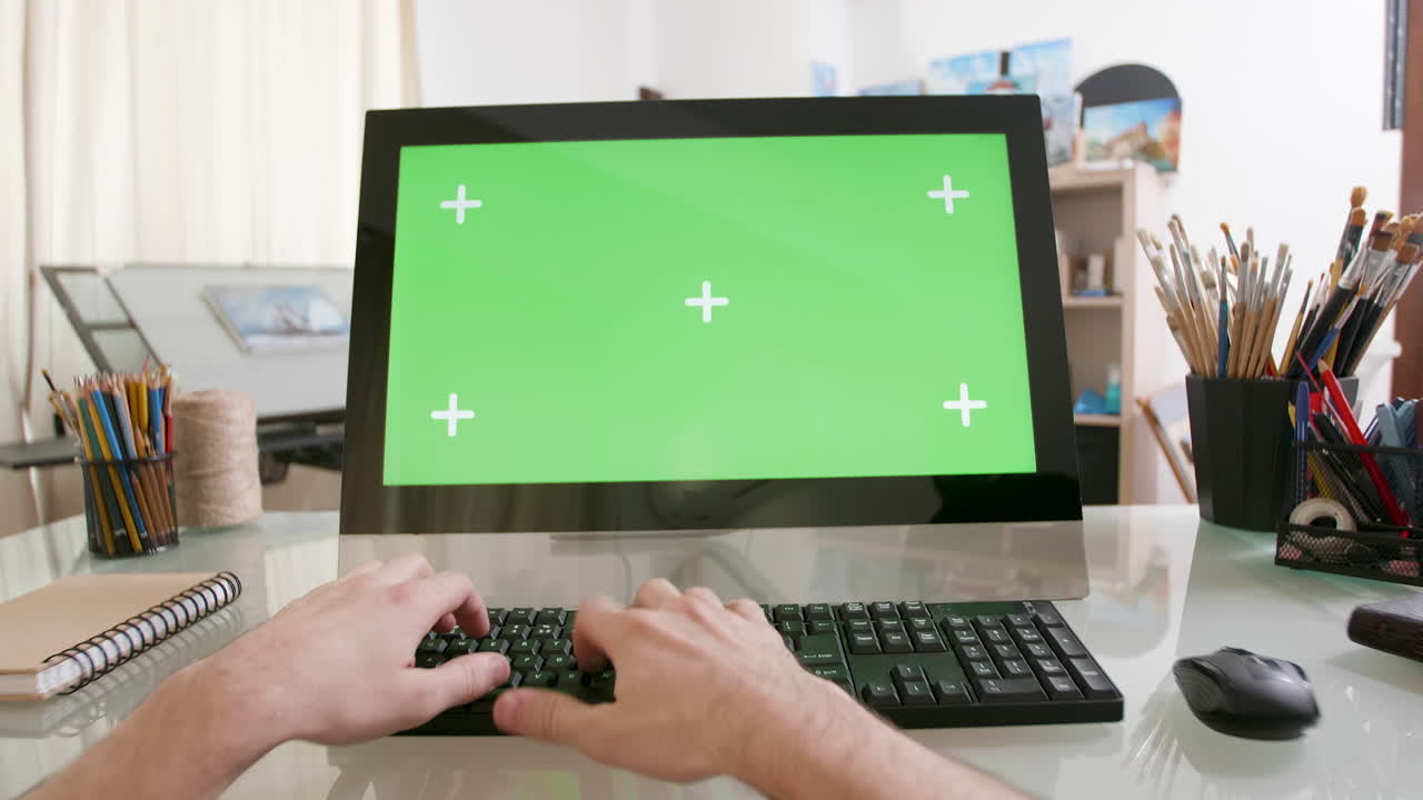 Typing on a Computer with a Green Screen