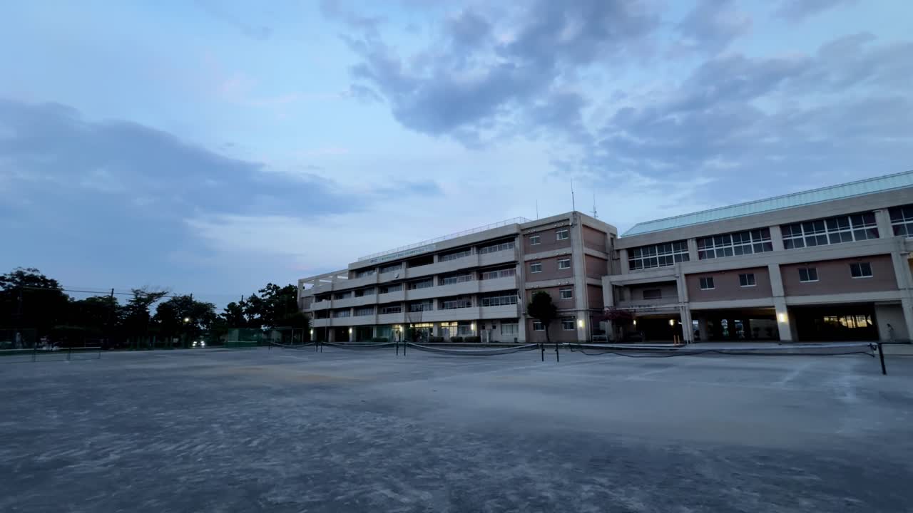 School building under cloudy sky