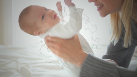 animation of moving network of connections over caucasian mother holding baby