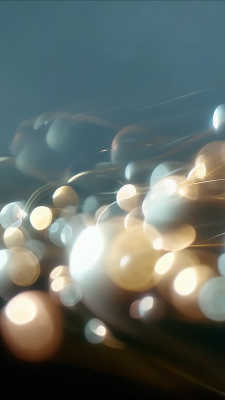 A mesmerizing display of light and movement, showcasing ethereal glowing orbs intertwined with flowing strands in a captivating abstract composition
