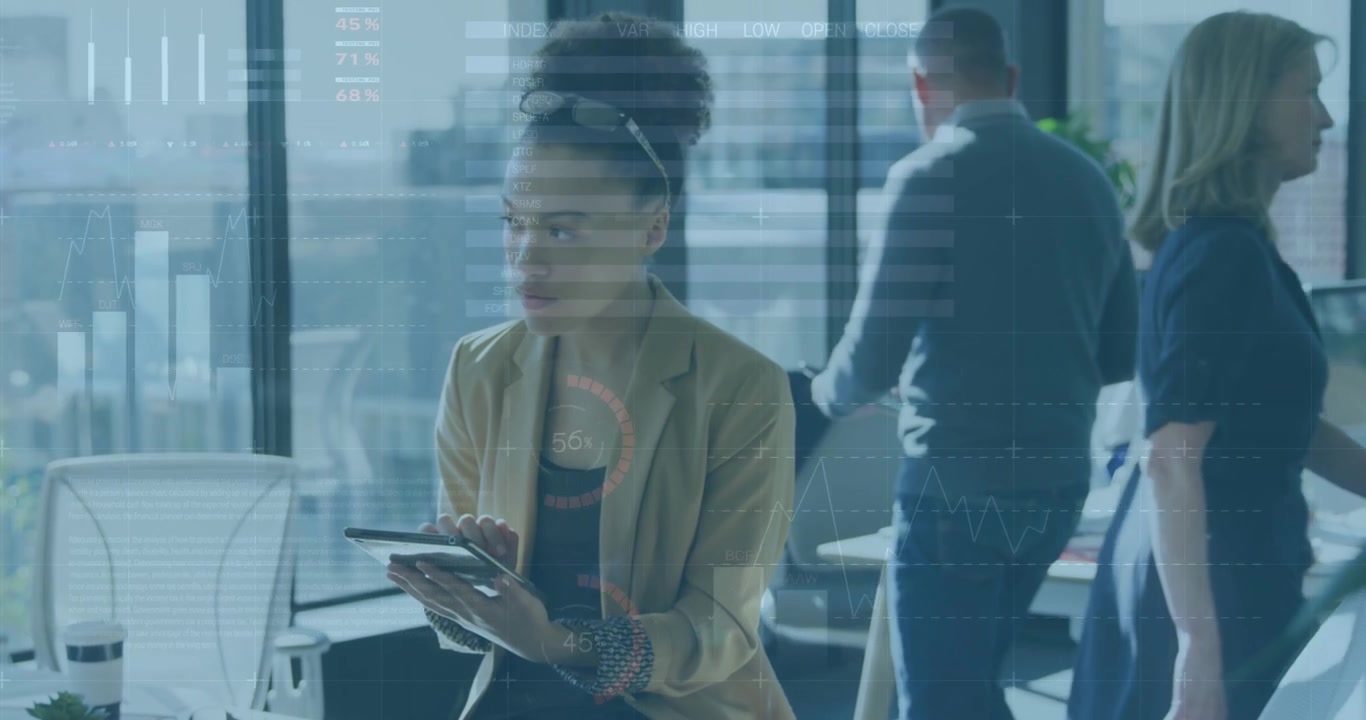 Animation of data processing over businesswoman using tablet