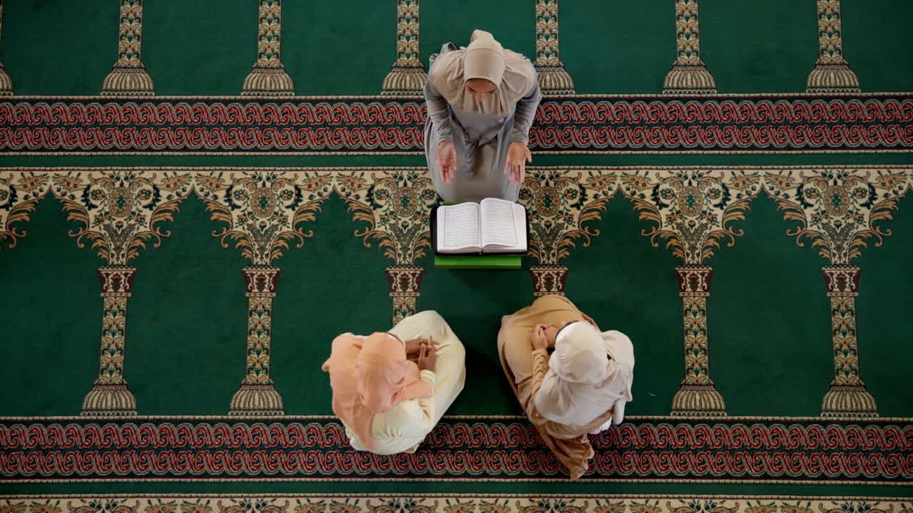 Muslim women praying in a mosque