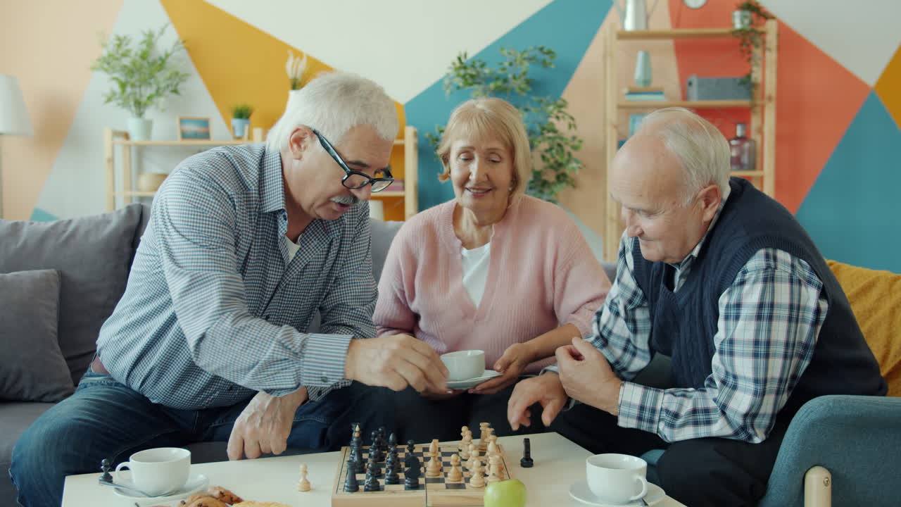 Elderly Friends Enjoying a Game of Chess at Home
