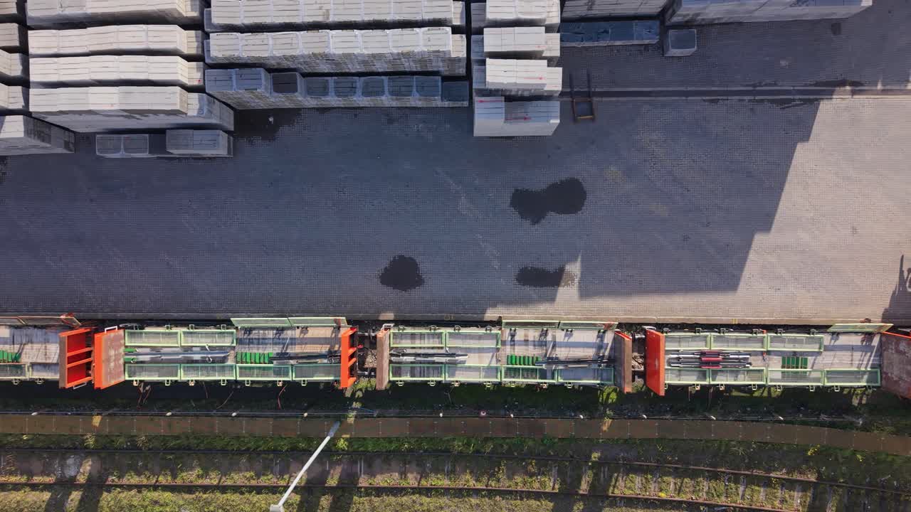 Aerial View of Freight Train Transporting Concrete in Daytime