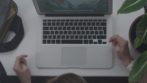 woman working on laptop at desk