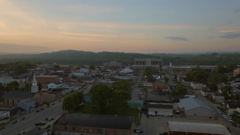 Aerial-flyover-main-street-in-Lawrenceburg,-Indiana-on-a-beautiful-morning-at-sunrise