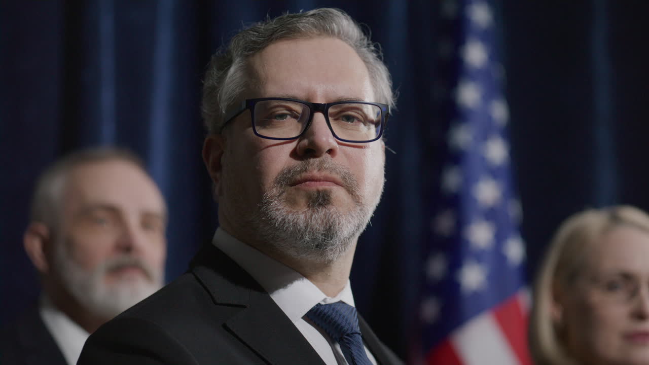 Portrait of Politician Posing Confidently with Team during Press Conference