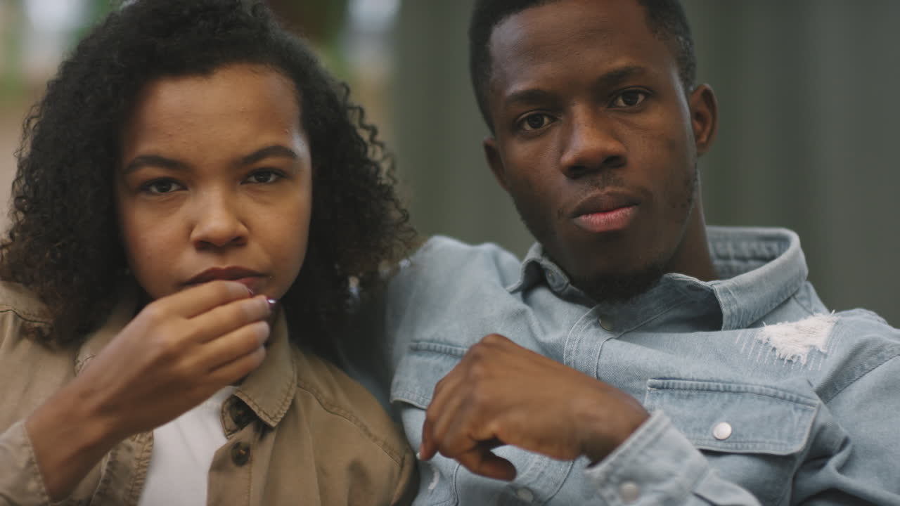 POV Of Afro Couple Watching TV