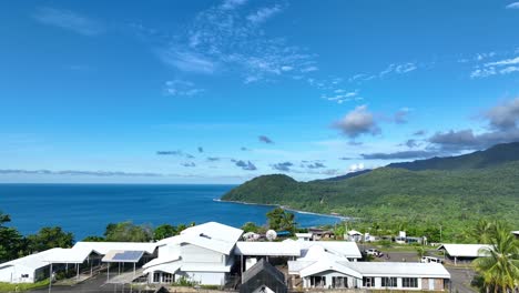 the indonesian border monument, papua new guinea, above the ocean and mountains is very beautiful, taken with a drone view