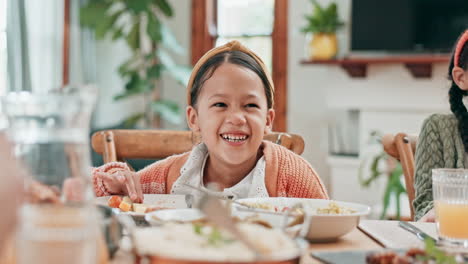 Kid,-laughing-and-girl-at-table-for-lunch