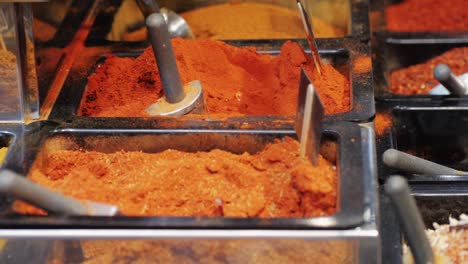 mix spices dried pink, black pepper, green dill, red paprika, yellow turmeric, garlic, salt close-up macro. a bunch of natural spice for food .seasonings and condiments concept