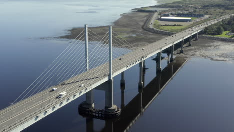 an aerial view of kessock bridge in inverness on a sunny summer's morning