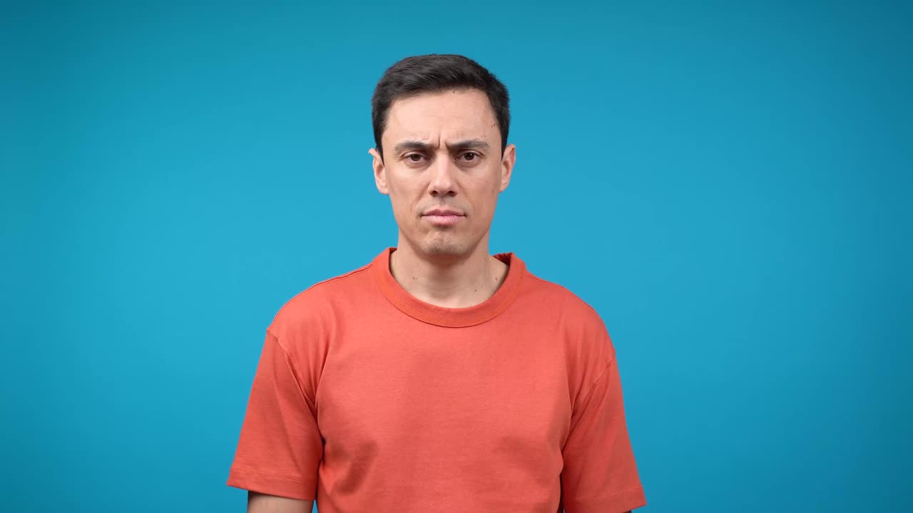 A man with various happy and laughing facial expressions against a blue background