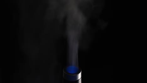 smoke and blue light from a device