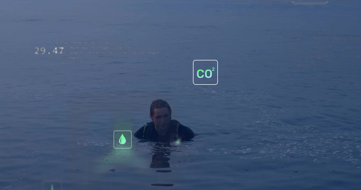 Vertical video: Man treading water, sensor spawning overlays around him showing CO2 for environment