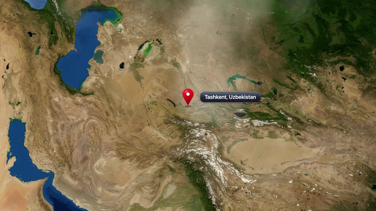 Satellite animation zooming from global Earth view to a pin marker over Tashkent, Uzbekistan. Includes NASA public domain imagery.