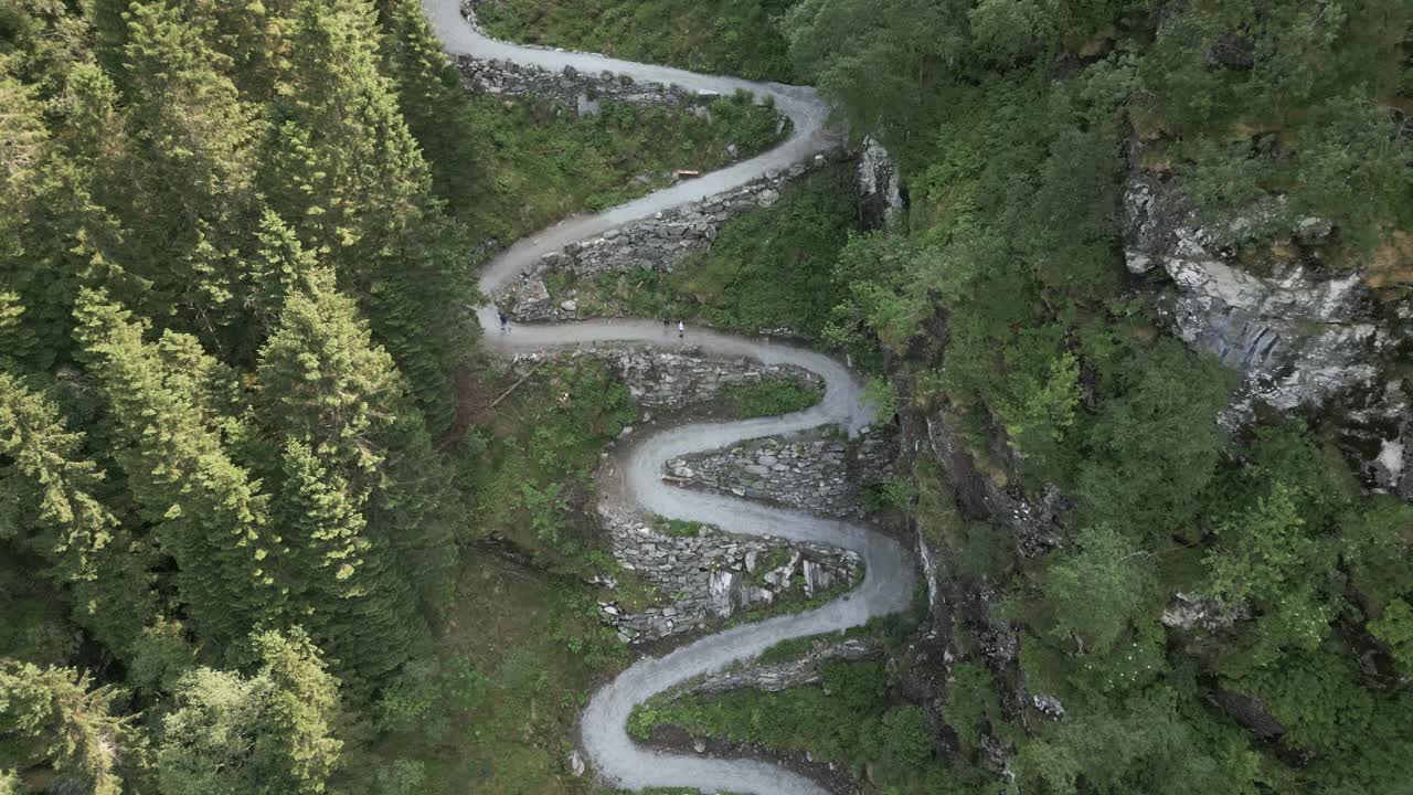 Still View of People Walking up Kossdalssvingene in Oster&oslash;y, Norway