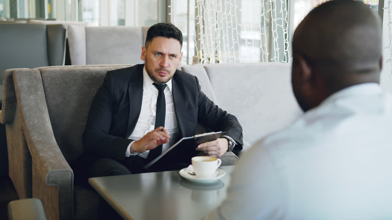 Business Meeting in a Coffee Shop