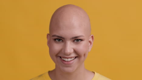 smiling bald woman