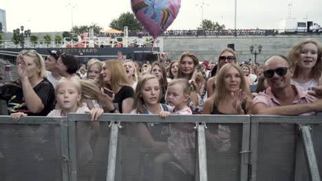 crowd at a summer outdoor concert or festival