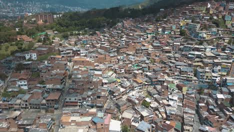 Drone-aerial-wide-view-of-medellin-city,-taken-from-comuna-13-slums-in-Medellin,-Colombia,-South-Amerca