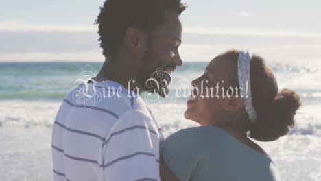 smiling couple on beach with long live the revolution text over animation