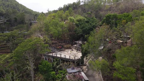 Aerial-view-of-the-courtyard-before-entering-the-Gong-cave-entrance-in-Pacitan,-Indonesia