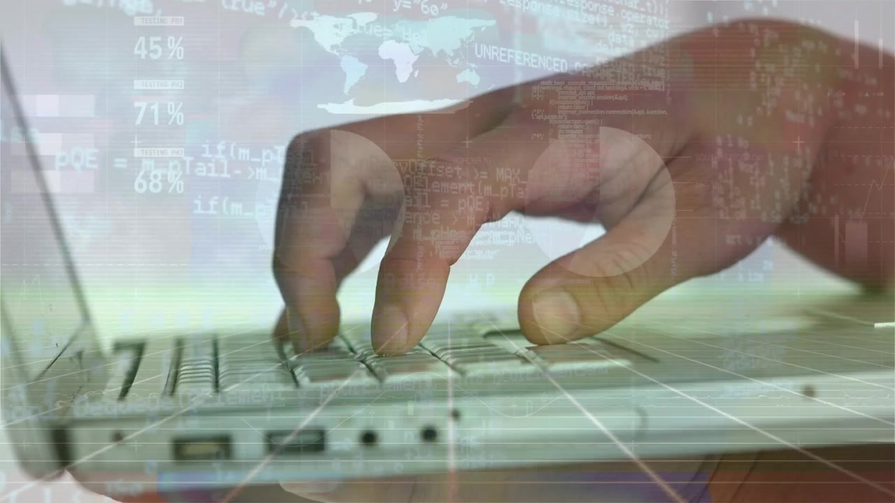 Animation of financial data over hands of caucasian man using laptop